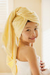 © Don Mason/Blend Images - Mixed race girl wrapped in a towel