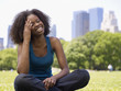 © Granger Wootz/Blend Images - African woman laughing in park