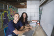 © Vico Collective/Erik Palmer/Blend Images - Couple operating small business in garage
