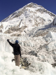 Wall Mural - Climber stands in the Khumbu Ice-field, Mt Everest, Nepal.