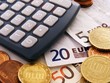 Calculator with euro notes & coins