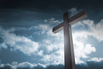 cross on dark sky