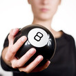 Woman holding 8 black ball