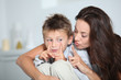 © goodluz - Mother and son having fun at home