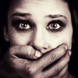 Scared woman victim of domestic violence and abuse