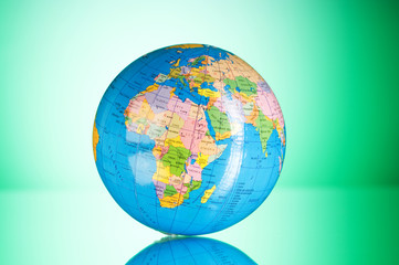 globalisation concept - globe against gradient colorful backgrou