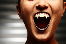 Close Up Of A Vampire Woman's Mouth