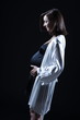 © snaptitude - beautiful caucasian pregnant  woman in nightie