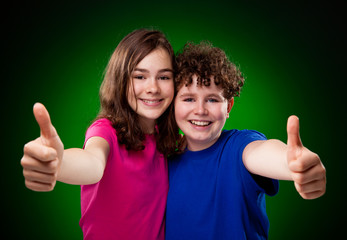 Kids showing OK sign