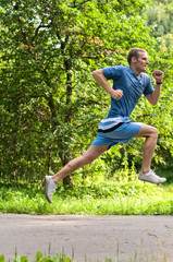 young man running in park