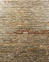 Section Of A Very Old Worn Gray Painted Brick Wall