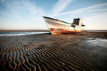 Aground Boat On The Beach