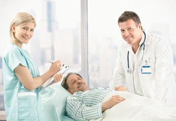 Wall Mural - Portrait of doctor, nurse and patient