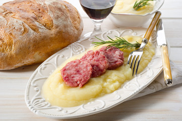 Canvas Print - slice sausage with mashed potatoes-pure' di patate con cotechino