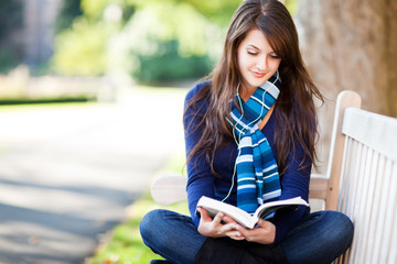 Mixed race ollege student studying