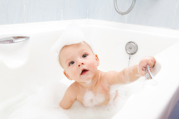 Baby taking bath