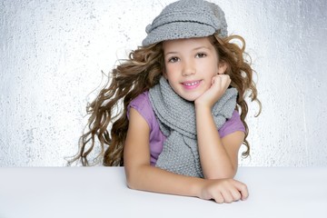 Wall Mural - winter cap wool scarf litle fashion girl wind on hair