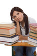 © mocker_bat - Hispanic college student woman with stack of books