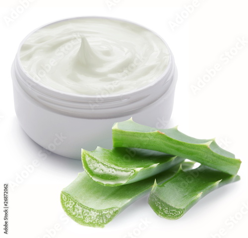 Fotografie, Obraz Opened plastic container with cream and aloe.