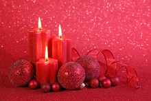 Red Christmas Candles On Red Background
