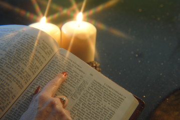 Student Studying Bible Scriptures Candlelight