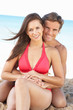© Monkey Business - Young Couple Enjoying Beach Holiday