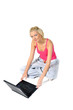© Robert Latawiec - young girl in tracksuit with laptop