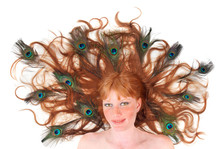 Pretty Red-head Woman With Peacock Feathers In Her Hair