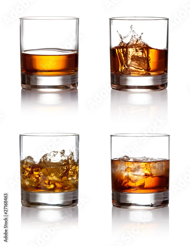 Fotografie, Obraz Glass of scotch whiskey and ice on a white background