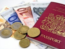 Passport With Euro Banknotes & Coins