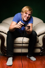 young man playing video games