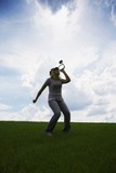 Fototapeta Sport - Woman Playing Horn