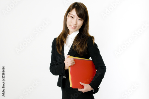 書類を持つ女性社員 Stock Photo Adobe Stock 書類を持つ女性社員 Stock Photo Adobe Stock