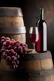 Fototapeta  - glass red vine with barrel