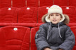 © Pavel Losevsky - Boy sits in expectation of  hockey match