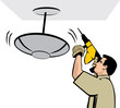 Man installing a ceiling lamp