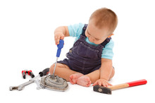 Little Boy Playing With Tools