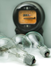 Lamp Bulb And Electricity Supply Meter