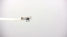 Old Biplane Performing Aerial Stunt