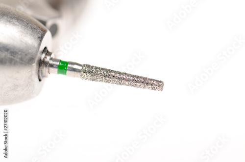 Fotomural Dental diamond bur closeup in high speed dental handpiece