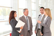 © goodluz - Business people meeting in congress hall