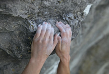 Rock Climber's Hands On Handhold