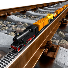 A Miniature Model Of The Train Rides On Big Tracks