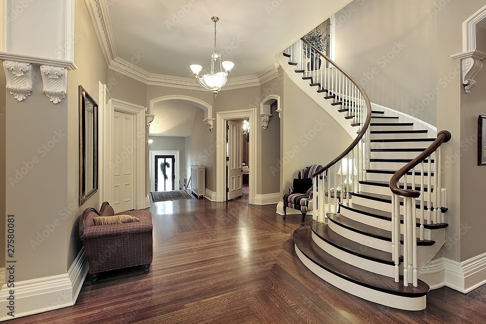 Foyer with curved staircase - obrazy, fototapety, plakaty 