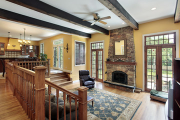 Family room with wood ceiling beams