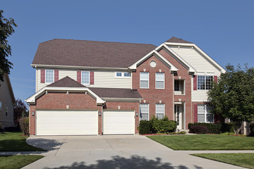 Wall Mural - Brick home with three car garage