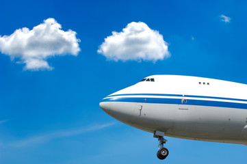 Wall Mural - Jumbo plane and clouds