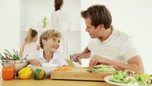 Family Preparing Vegetables