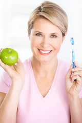 Wall Mural - Woman with a  toothbrush