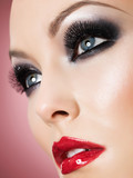 Beautiful girl with smoky style make-up